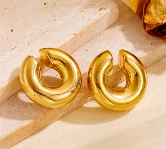 Gold chuck cuff earrings